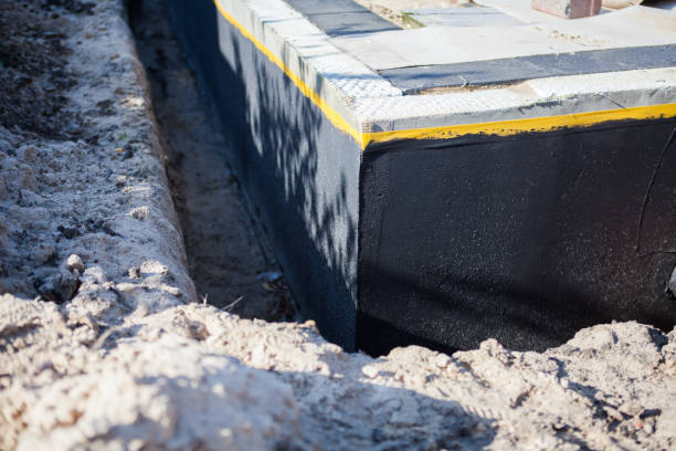 Professional Waterproofing technician working in Mecca, IN